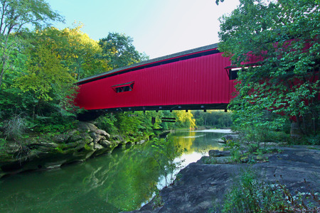 Narrows Covered Bridge spans Sugar Creek at Turkey Run State Park in Indianaの写真素材
