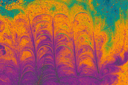 An abstract background of mixed colorful paints in different shapes