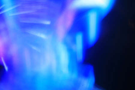 An abstract background with glow vortex light effectの写真素材