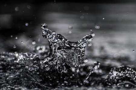 A grayscale shot of a water splash - perfect for wallpaperの写真素材