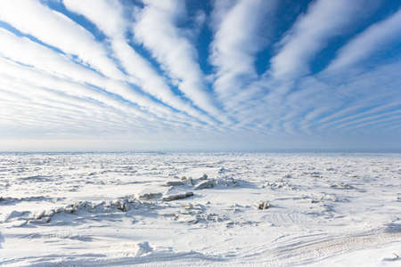An aerial photo of the frozen sea in the Arctic Circle near Barrow, Alaskaの写真素材