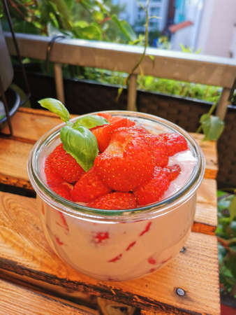an vegetarian yogurt with strawberriesの写真素材