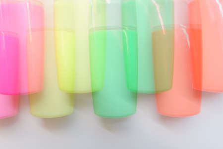 Colored design of magenta, yellow, green and orange markers.