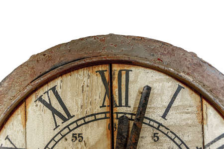 A close up shot of a vintage worn out clock