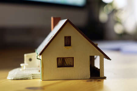 A closeup of a miniature house - Real estate conceptの写真素材