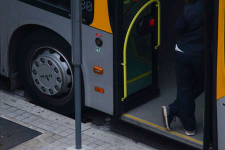 BARCELONA, SPAIN - Feb 02, 2020: Bus driver on street during COVID-19 confinement in Barcelona,Spain. Coronavirus Crisisのeditorial素材