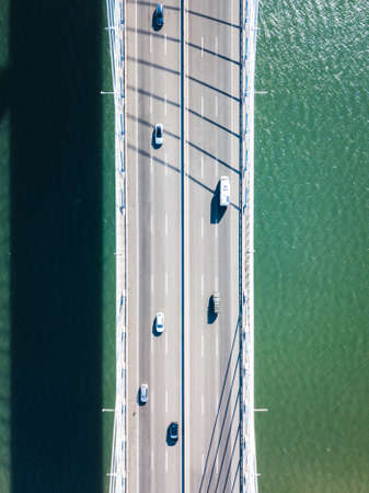 Top down view of a bridge over the sea in Lisbon, Portugal