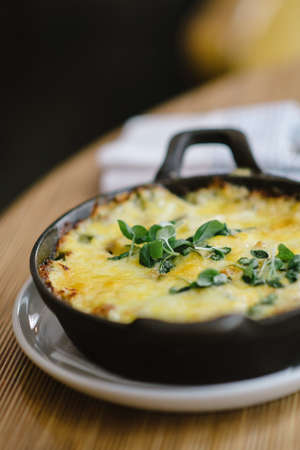 A closeup shot of a julienne with green ingredientsの写真素材