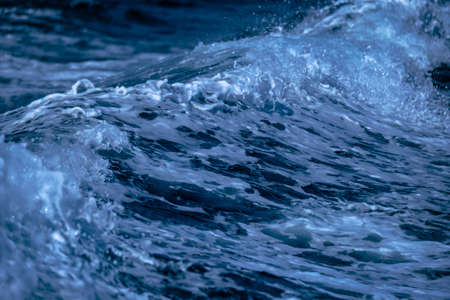 A closeup shot of a sea wave