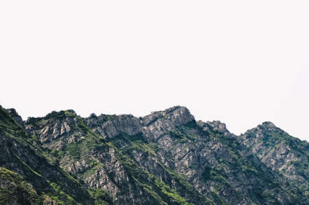 The beautiful scenery of the rocky and snowy mountains in the countryside