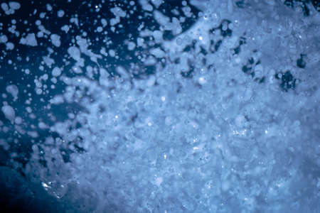 A closeup of a sea wave splash