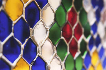 A closeup shot of a colorful mosaic glass wall for background or wallpaper