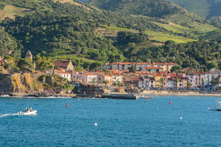 An aerial shot of a coastal city near a beautiful seascapeの写真素材