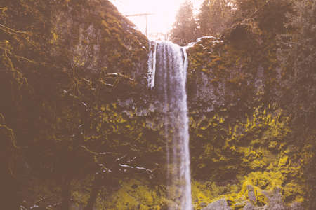 A late-winter view of the point where Pup Creek plunges over a basalt ledge just before joining the Clackamas Riverの写真素材