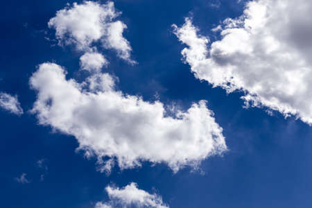 An upshot of the beautiful blue sky with breathtaking large white clouds