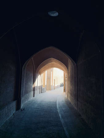 A vertical shot of a hallway in Kashan