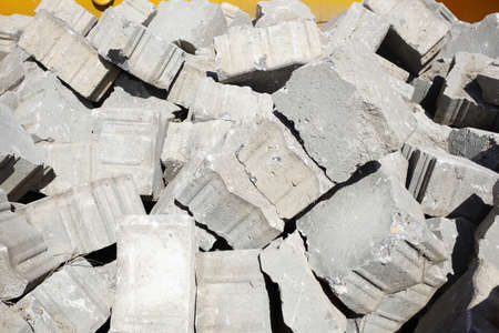 A closeup of bricks on the ground in a construction area under the sunlight