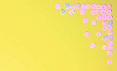 Yellow background with cute pink buttons