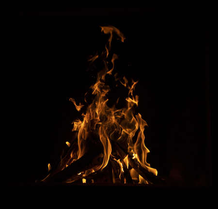 Close-up of a bonfire with dark background