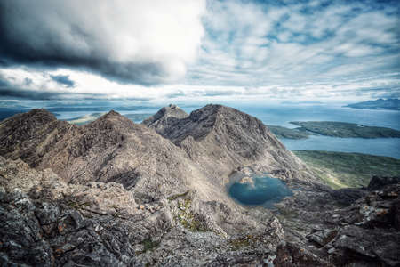 A beautiful rocky field with breathtaking sunny and cloudy sky