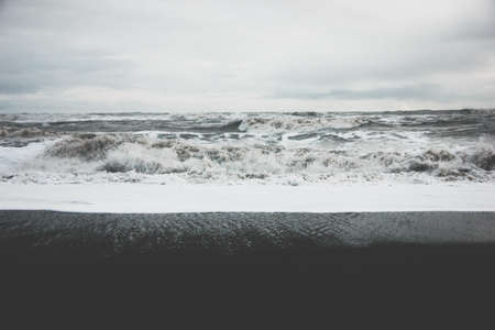 The beautiful scenery of amazing strong ocean waves during misty weather in the countryside
