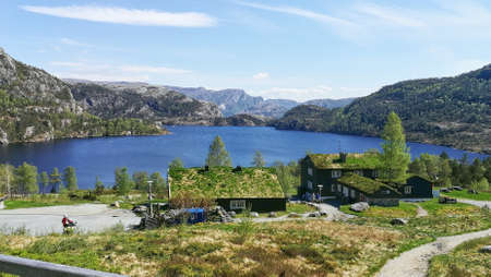 A beautiful scenery of houses by the sea in the Norwegian fjords