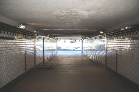 An underground tunnel that leads to the outsideの写真素材