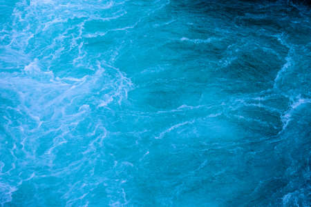 A closeup of a clear water sea waves