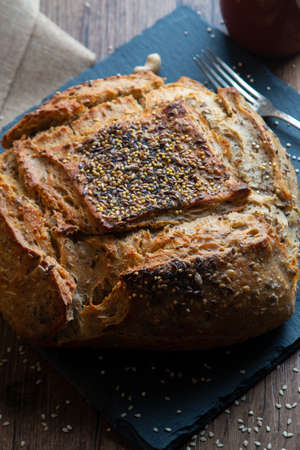 A vertical shot of bread next to the fork