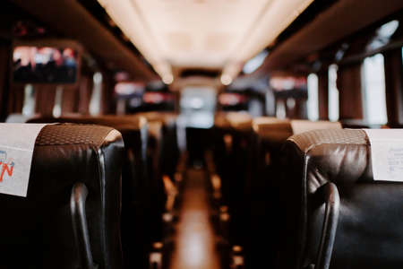 A closeup of black seats in the busの写真素材
