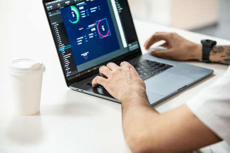 Working on a laptop hands - business photography
