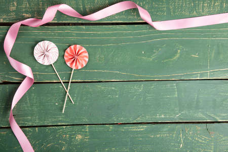 Decorative umbrellas with ribbons on green background - Valentine's Dayの写真素材