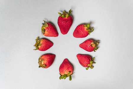 The sweet red strawberries sorted in a round shapeの写真素材