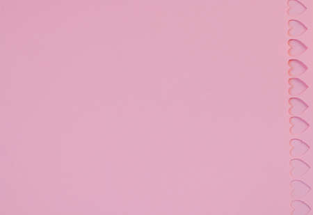 Colorful background with cutout hearts with space for text - Valentine's Day