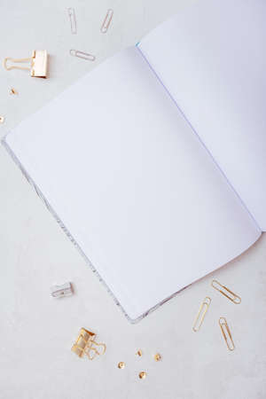 A close up shot business study essentials on a white desk - work and study aesthetics
