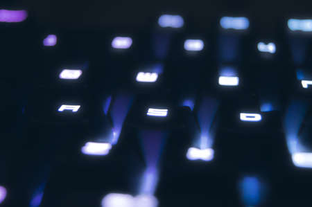 A closeup of led lit keyboard buttons