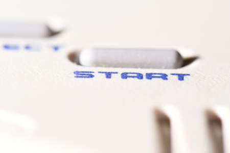 A closeup shot of buttons on a white gamepad