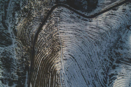 Beautiful drone shot of snowy hillsの写真素材