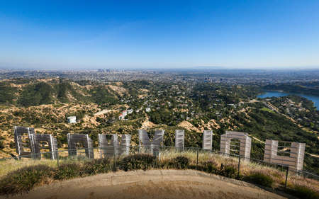 HOLLYWOOD, CALIFORNIA, UNITED STATES - Jun 03, 2019: A view across the greater Los Angeles metropolitan area from the summit of Mt. Lee just above the iconic Hollywood Sign.のeditorial素材