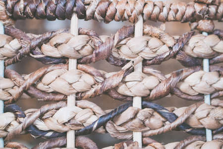 A closeup shot of patterned basket weaves wallpaperの写真素材