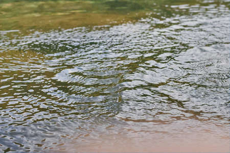 A beautiful shot of a clear river flowing downstream