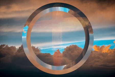 A wide shot of the sky with thick clouds and a cool futuristic circle edited on the photoの写真素材