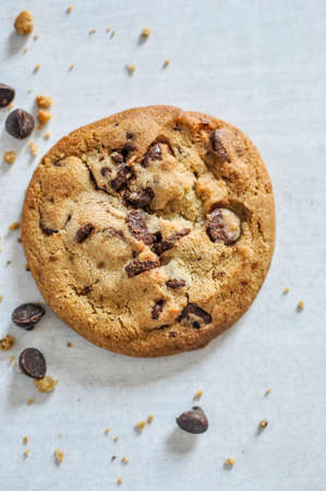A vertical closeup shot of baked chocolate cookie