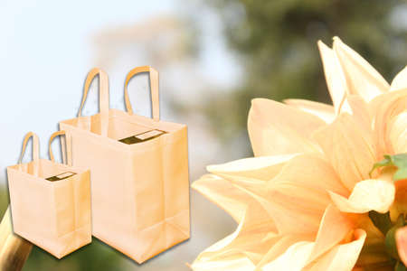 The yellow fabric bags on natural backgroundの写真素材