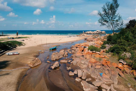 The sandy beach captured during the daytimeの写真素材
