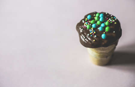 A selective closeup shot of a decorated chocolate ice cream