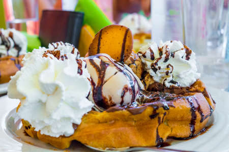 A selective closeup focus shot of a delicious waffle ice-cream with a blurry background
