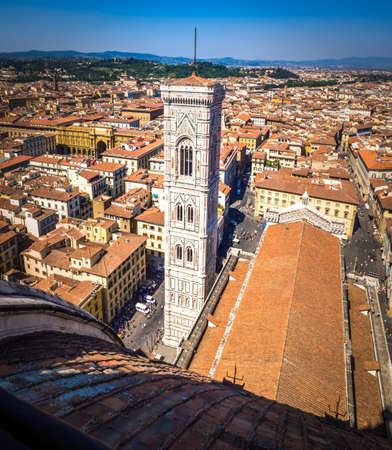 A vertical aerial shot of Cathedral of Santa Maria del Fiore and the buildings in Florence, Italyの写真素材