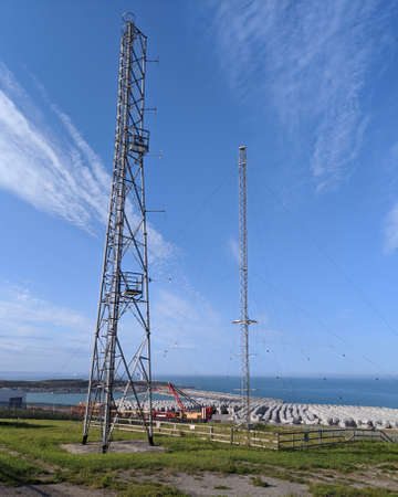 Metal structure Radio Antenna overlooking an incomplete Harbor Constructionの写真素材