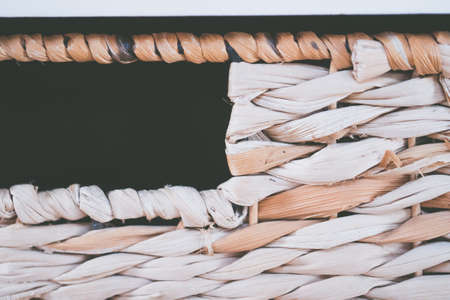 A closeup shot of patterned basket weaves wallpaper